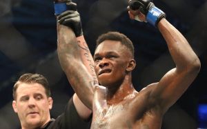 Реакция в Твиттере на завоевание Исраэлем Адесаньей титула чемпиона на UFC 243