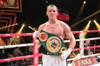 Российский боксер Трояновский защитил титулы чемпиона мира по версии IBO и IBF