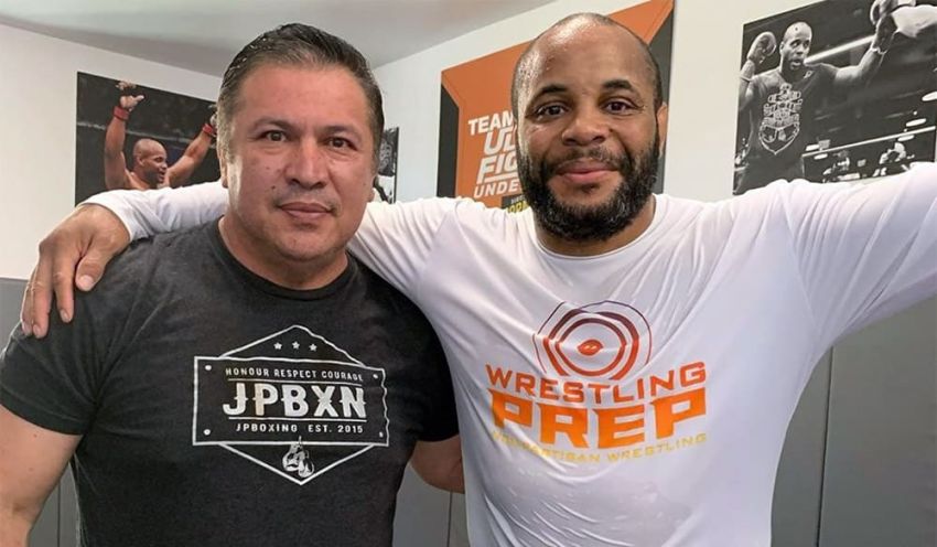 Javier Mendez told the story of how Daniel Cormier once kissed him on the lips.