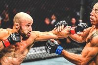 Марлон Мораес одолел Жозе Альдо в близком поединке на UFC 245