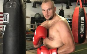Сергей Кузьмин нокаутировал Малкольма Танна